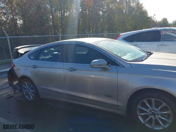 2017 Ford Fusion Energi Titanium with VIN 3FA6P0SU9HR191425, listed as a IAAI auction lot 40798419 with 118,659 mi miles. Bid and sale history available at carsss.com. Image 13.