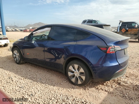 2022 Tesla Model Y Long Range with VIN 7SAYGDEE9NF411810, listed as a Copart auction lot 86772604 with 33,497 mi miles and Salvage Title. Bid and sale history available at carsss.com. Image 2.