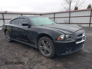 2014 Dodge Charger SXT with VIN 2C3CDXJG2EH243662, listed as a IAAI auction lot 41812674 with 114,108 mi miles. Bid and sale history available at carsss.com. Image 1.
