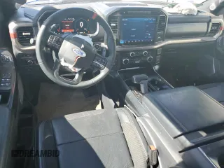 2023 Ford F-150 Raptor with VIN 1FTFW1RGXPFC88745, listed as a Copart auction lot 47529385 with 32,220 mi miles and Salvage Title. Bid and sale history available at DreamBid. Image 8.