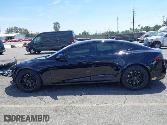 2022 Tesla Model S with VIN 5YJSA1E51NF464231, listed as a IAAI auction lot 42077838 with 53,290 mi miles and . Bid and sale history available at DreamBid. Image 15.