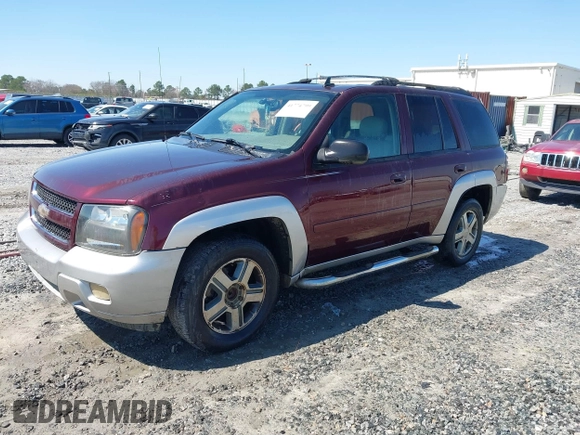 2006 Chevrolet TrailBlazer LT with VIN 1GNES13M262161488, listed as a IAAI auction lot 41774799 with 214,132 mi miles. Bid and sale history available at carsss.com. Image 2.