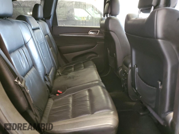 2014 Jeep Grand Cherokee Limited z VIN 1C4RJFBG4EC294770, wystawiony jako Copart lot #57468985 z przebiegiem 190 989 mil mil oraz Szkoda całkowita • Salvage title. Historia ofert i sprzedaży dostępna na DreamBid. Obrazek 10.