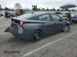 2019 Toyota Prius L Eco z VIN JTDKARFU0K3087436, wystawiony jako Copart lot #55699135 z przebiegiem Nie podano mil oraz Szkoda całkowita • Salvage title. Historia ofert i sprzedaży dostępna na DreamBid. Obrazek 3.