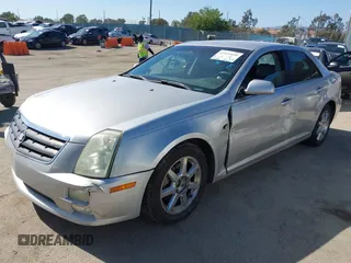 2005 Cadillac STS z VIN 1G6DW677350224198, wystawiony jako IAAI lot #42321639 z przebiegiem 122 208 mil mil oraz . Historia ofert i sprzedaży dostępna na DreamBid. Obrazek 21.