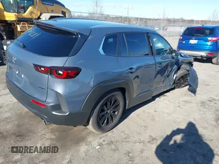 2024 Mazda CX-50 S Select with VIN 7MMVABAMXRN238079, listed as a IAAI auction lot 41563281 with 5,576 mi miles and . Bid and sale history available at DreamBid. Image 4.