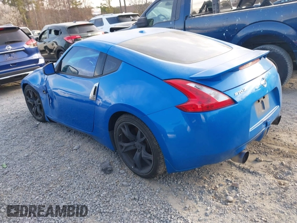 2009 Nissan 370Z Touring with VIN JN1AZ44E39M400201, listed as a IAAI auction lot 41710283 with 245,735 mi miles and . Bid and sale history available at DreamBid. Image 3.