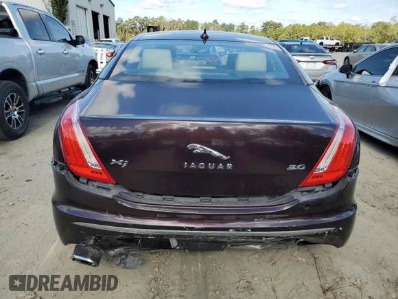 2013 Jaguar XJ z VIN SAJWA1C75D8V54004, wystawiony jako Copart lot #76922464 z przebiegiem 107 175 mil mil oraz Szkoda całkowita • Salvage title. Historia ofert i sprzedaży dostępna na DreamBid. Obrazek 6.