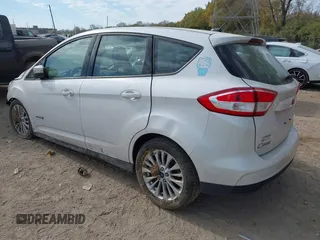 2018 Ford C-Max SE with VIN 1FADP5AU9JL101345, listed as a IAAI auction lot 40675761 with 96,842 mi miles and . Bid and sale history available at DreamBid. Image 3.