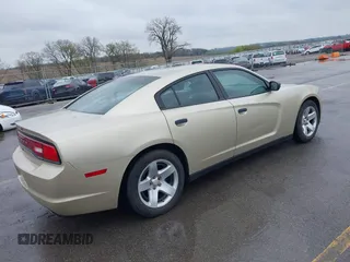 2013 Dodge Charger Police with VIN 2C3CDXAT9DH692946, listed as a IAAI auction lot 42115225 with 107,086 mi miles. Bid and sale history available at carsss.com. Image 4.
