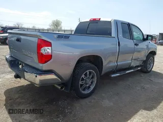 2018 Toyota Tundra 2WD SR with VIN 5TFRM5F16JX133735, listed as a IAAI auction lot 41818455 with 148,456 mi miles. Bid and sale history available at carsss.com. Image 4.
