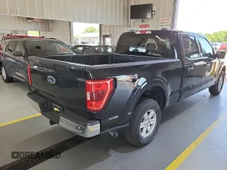 2021 Ford F-150 XL with VIN 1FTFW1E52MFB64744, listed as a IAAI auction lot 42733866 with 98,411 mi miles and . Bid and sale history available at DreamBid. Image 16.