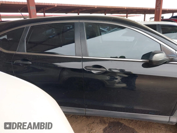 2013 Honda CR-V LX with VIN 2HKRM3H36DH511653, listed as a IAAI auction lot 39041262 with 90,336 mi miles and . Bid and sale history available at DreamBid. Image 13.