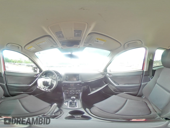 2015 Mazda CX-5 Sport with VIN JM3KE4BY9F0479748, listed as a Copart auction lot 58847805 with 122,698 mi miles and Salvage title. Bid and sale history available at DreamBid. Image 16.