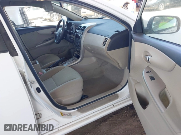 2011 Toyota Corolla L with VIN 2T1BU4EE3BC604630, listed as a IAAI auction lot 41986565 with 132,325 mi miles. Bid and sale history available at carsss.com. Image 5.