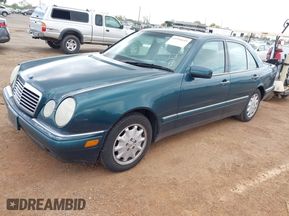 1996 Mercedes-Benz E-Class with VIN WDBJF55F7TJ022572, listed as a IAAI auction lot 41936649 with 187,706 mi miles. Bid and sale history available at carsss.com. Image 2.