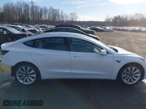 2019 Tesla Model 3 Long Range with VIN 5YJ3E1EB7KF442390, listed as a IAAI auction lot 41700122 with 65,539 mi miles. Bid and sale history available at carsss.com. Image 14.