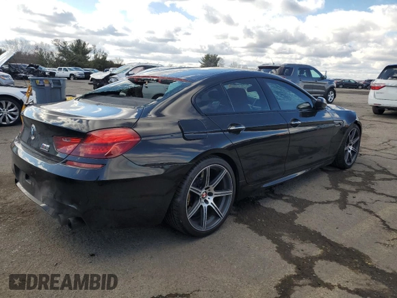 2014 BMW M6 with VIN WBS6C9C54ED467332, listed as a Copart auction lot 47421275 with 33,910 mi miles and Salvage title. Bid and sale history available at DreamBid. Image 3.