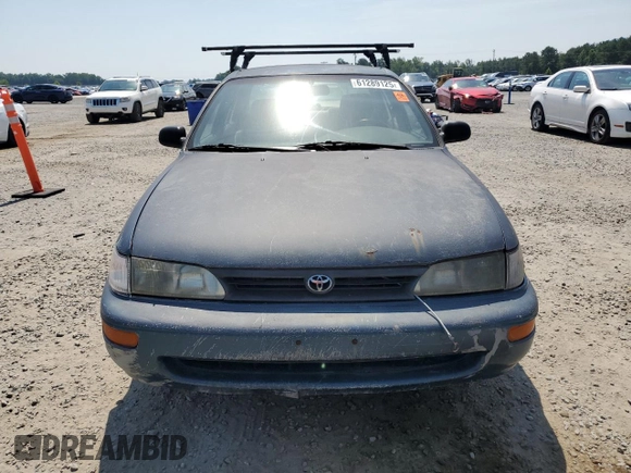1994 Toyota Corolla Deluxe with VIN 2T1AE09B5RC080960, listed as a Copart auction lot 61289125 with 189,776 mi miles and Non repairable. Bid and sale history available at DreamBid. Image 5.