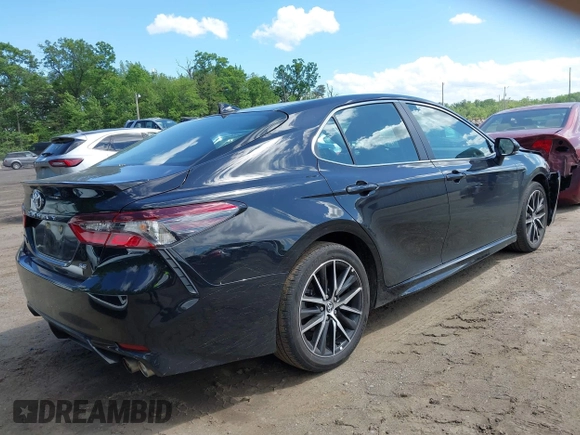 2023 Toyota Camry SE with VIN 4T1G11AK2PU828745, listed as a IAAI auction lot 42193957 with 35,399 mi miles and . Bid and sale history available at carsss.com. Image 4.