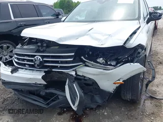 2022 Volkswagen Tiguan SE with VIN 3VV3B7AX3NM176770, listed as a IAAI auction lot 42114378 with 37,448 mi miles and . Bid and sale history available at DreamBid. Image 6.