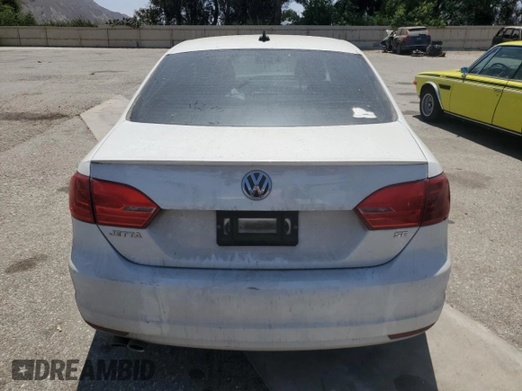 2014 Volkswagen Jetta SE with VIN 3VWD17AJ5EM295208, listed as a Copart auction lot 64684005 with 94,133 mi miles and Salvage title. Bid and sale history available at DreamBid. Image 6.