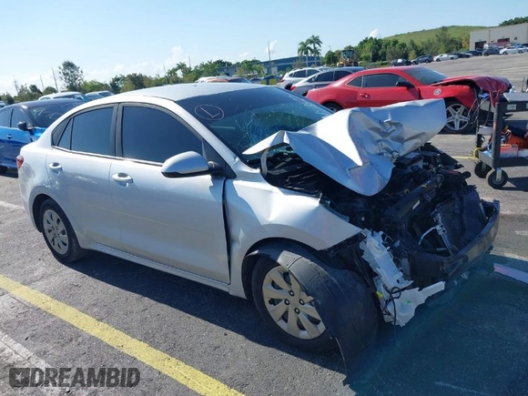 2018 Kia Rio LX with VIN 3KPA24AB0JE054428, listed as a IAAI auction lot 40101162 with 107,857 mi miles. Bid and sale history available at carsss.com. Image 1.
