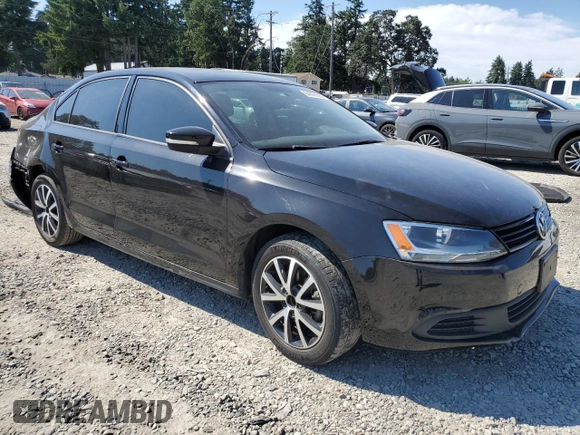 2014 Volkswagen Jetta SE z VIN 3VWD17AJ2EM397825, wystawiony jako Copart lot #64076595 z przebiegiem 61 691 mil mil oraz Szkoda całkowita • Salvage title. Historia ofert i sprzedaży dostępna na DreamBid. Obrazek 4.