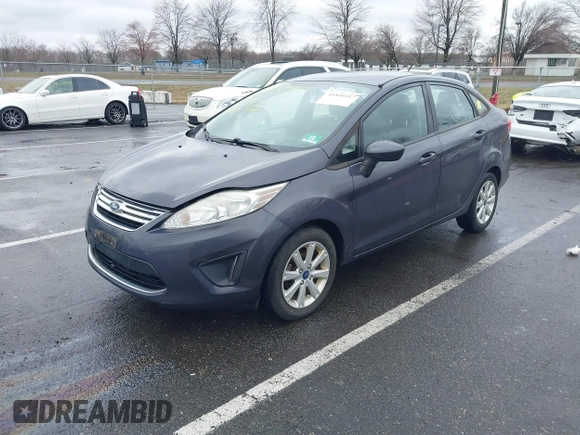 2012 Ford Fiesta SE with VIN 3FADP4BJ0CM155729, listed as a IAAI auction lot 41800447 with 90,091 mi miles. Bid and sale history available at carsss.com. Image 17.