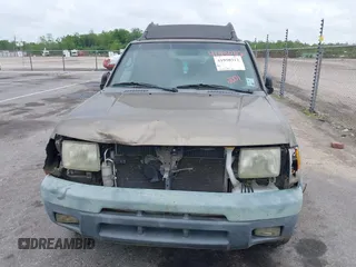 2001 Nissan Xterra XE z VIN 5N1ED28T51C588588, wystawiony jako IAAI lot #41950312 z przebiegiem 258 890 mil mil oraz . Historia ofert i sprzedaży dostępna na DreamBid. Obrazek 6.