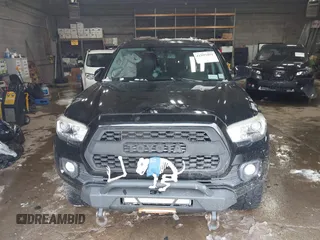 2016 Toyota Tacoma SR with VIN 3TMCZ5AN5GM037336, listed as a IAAI auction lot 41599492 with 76,262 mi miles. Bid and sale history available at carsss.com. Image 12.