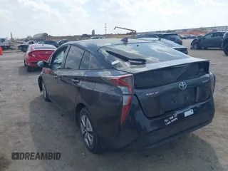 2017 Toyota Prius Two z VIN JTDKARFU3H3030401, wystawiony jako IAAI lot #41882552 z przebiegiem 130 786 mil mil oraz . Historia ofert i sprzedaży dostępna na DreamBid. Obrazek 3.