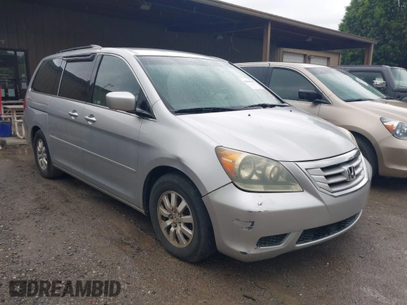 2010 Honda Odyssey EX with VIN 5FNRL3H48AB017784, listed as a IAAI auction lot 42096852 with 126,138 mi miles. Bid and sale history available at carsss.com. Image 1.