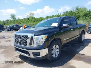 2018 Nissan Titan SV with VIN 1N6AA1EJ4JN529655, listed as a IAAI auction lot 42051405 with 153,599 mi miles and . Bid and sale history available at DreamBid. Image 17.