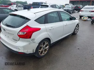 2014 Ford Focus Titanium with VIN 1FADP3N24EL184220, listed as a IAAI auction lot 42429610 with 172,575 mi miles and . Bid and sale history available at DreamBid. Image 4.