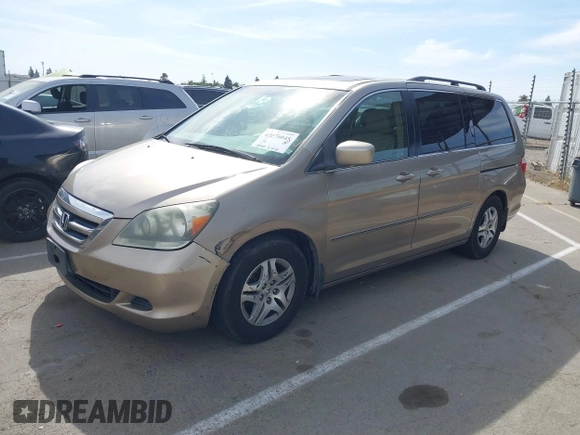 2005 Honda Odyssey EX-L z VIN 5FNRL38615B407908, wystawiony jako IAAI lot #42076045 z przebiegiem 170 950 mil mil oraz . Historia ofert i sprzedaży dostępna na DreamBid. Obrazek 2.