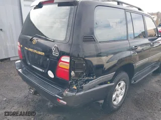1998 Toyota Land Cruiser with VIN JT3HT05J2W0017214, listed as a IAAI auction lot 41716028 with 214,047 mi miles. Bid and sale history available at carsss.com. Image 6.