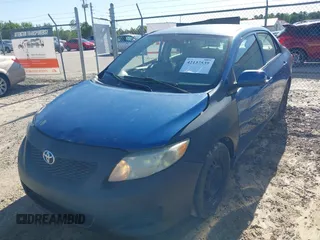 2009 Toyota Corolla with VIN 2T1BU40E69C166333, listed as a IAAI auction lot 42137539 with 127,564 mi miles. Bid and sale history available at carsss.com. Image 2.