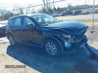 2023 Mazda CX-5 2.5 S with VIN JM3KFBAM9P0194078, listed as a IAAI auction lot 41579370 with 39,260 mi miles. Bid and sale history available at carsss.com. Image 14.