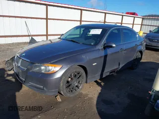 2006 BMW 3 Series 330xi with VIN WBAVD335X6KV66101, listed as a IAAI auction lot 41965628 with 142,246 mi miles. Bid and sale history available at carsss.com. Image 2.