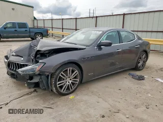 2018 Maserati Ghibli S Q4 GranLusso с VIN ZAM57YTL8J1265648, выставлен на аукционе Copart как лот 56295795 с пробегом 51 857 миль миль и Списание • Salvage title. История ставок и продаж доступна на DreamBid. Изображение 1.