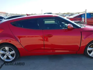 2013 Hyundai Veloster w/Gray Int z VIN KMHTC6AD0DU118150, wystawiony jako IAAI lot #41796309 z przebiegiem 249 384 mil mil oraz . Historia ofert i sprzedaży dostępna na DreamBid. Obrazek 13.