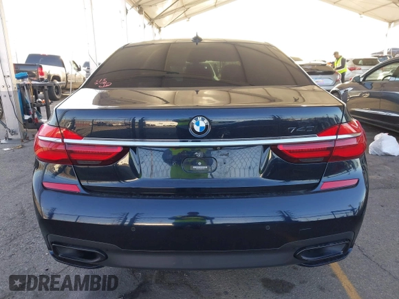 2019 BMW 7 Series 740i with VIN WBA7E2C58KB218419, listed as a IAAI auction lot 41831080 with 97,752 mi miles and . Bid and sale history available at DreamBid. Image 16.