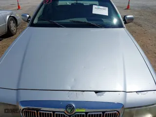 1998 Mercury Grand Marquis LS with VIN 2MEFM75W6WX669533, listed as a IAAI auction lot 41896982 with 153,155 mi miles. Bid and sale history available at carsss.com. Image 10.