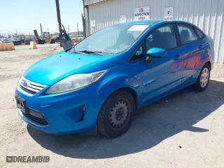 2012 Ford Fiesta SE with VIN 3FADP4BJ8CM162119, listed as a IAAI auction lot 41884379 with 129,200 mi miles. Bid and sale history available at carsss.com. Image 2.
