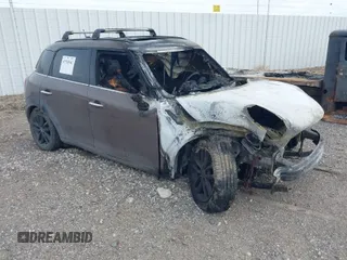 2012 MINI Countryman S with VIN WMWZC3C56CWM26958, listed as a IAAI auction lot 41765541 with Not Provided miles and . Bid and sale history available at DreamBid. Image 1.