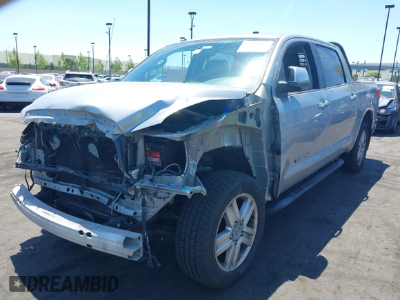 2013 Toyota Tundra Limited with VIN 5TFFY5F16DX135805, listed as a IAAI auction lot 42218616 with 151,310 mi miles and . Bid and sale history available at DreamBid. Image 2.