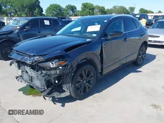 2021 Mazda CX-30 Premium with VIN 3MVDMBDYXMM307047, listed as a IAAI auction lot 41974966 with 53,409 mi miles and . Bid and sale history available at carsss.com. Image 2.