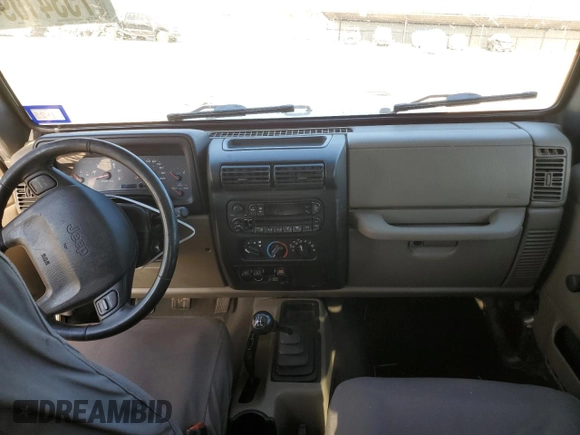 2003 Jeep Wrangler Rubicon with VIN 1J4FA69S73P339925, listed as a Copart auction lot 75341094 with Not provided miles and Salvage title. Bid and sale history available at DreamBid. Image 8.
