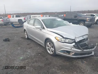 2018 Ford Fusion SE z VIN 3FA6P0HD2JR207865, wystawiony jako IAAI lot #41835895 z przebiegiem 91 069 mil mil oraz . Historia ofert i sprzedaży dostępna na DreamBid. Obrazek 1.